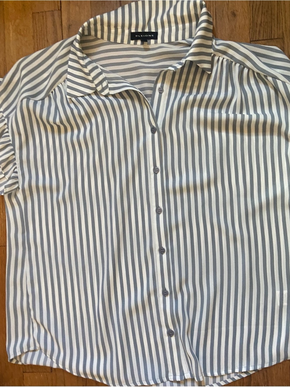 light gray button down shirt , short sleeve